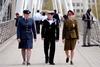 From left, a Royal Air Force servicewoman, a Royal Navy sailor and an Army soldier stroll through London prior to Armed Forces Day 1010.This image is fully model released.
