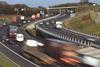 Lorries travelling on the A1/M motorway near Leeds Yorkshire UK