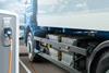 Electric,Truck,Batteries,Are,Charged,From,The,Charging,Station.,Concept