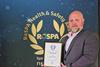 Main Ken Bell HSEQ Manager Palletline proudly displays the company's 12th RoSPA Gold Award