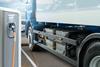 Electric,Truck,Batteries,Are,Charged,From,The,Charging,Station.,Concept