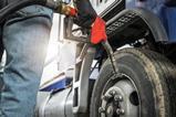 refueling-semi-truck-with-diesel-fuel-at-station