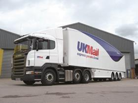 A Scania truck in UK Mail livery