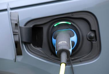 Electric-van-plugged-in-Vauxhall-Vivaro-scaled