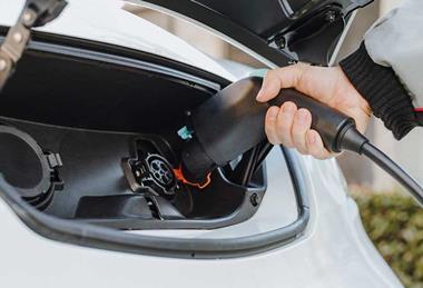 EV_van_charging_plugging_3