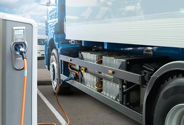 Electric,Truck,Batteries,Are,Charged,From,The,Charging,Station.,Concept