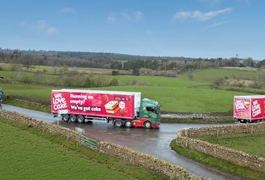 We Love Cake trucks on road