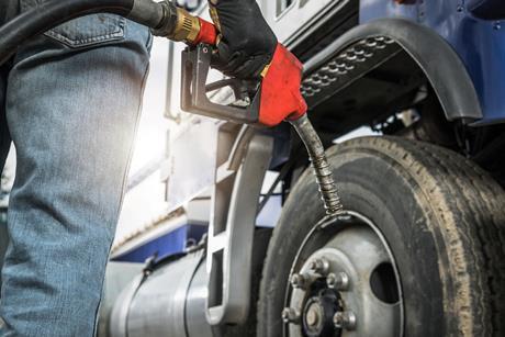 refueling-semi-truck-with-diesel-fuel-at-station