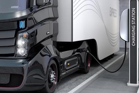 Hybrid electric truck being charging at charging station