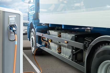 Electric,Truck,Batteries,Are,Charged,From,The,Charging,Station.,Concept