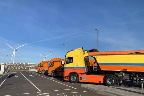 Trucks charging at the WattHub site at Rotterdam World Gateway terminal