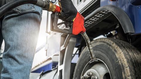 refueling-semi-truck-with-diesel-fuel-at-station