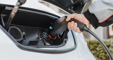 EV_van_charging_plugging_3
