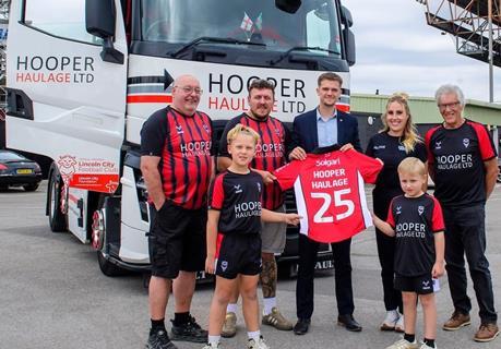 Hooper Haulage with Lincoln City FC executive Bobby Coppings