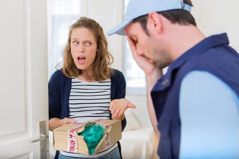 View,Of,A,Young,Attractive,Woman,Angry,Against,Delivery,Man