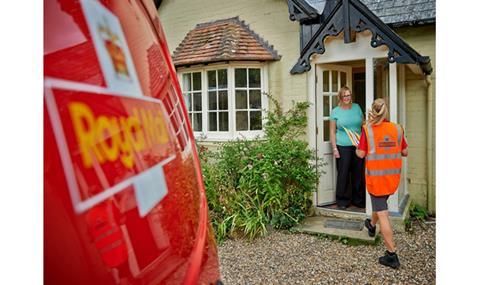 Royal_Mail_postwoman_delivering_to_house_fixed-600-width