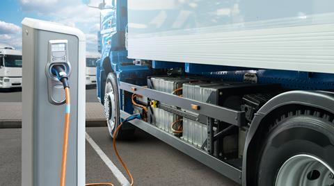 Electric,Truck,Batteries,Are,Charged,From,The,Charging,Station.,Concept
