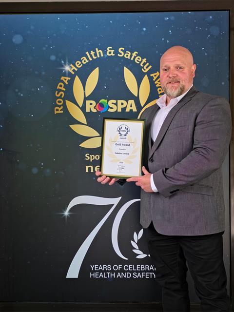 Ken Bell, HSEQ manager Palletline, proudly displays the company's 12th RoSPA Gold Award.
