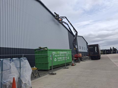 Final guttering work being completed at White’s new warehouse in Pershore.