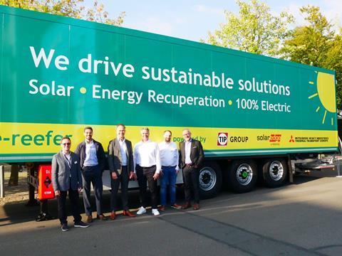 The SolarEdge e-Mobility, TIP Group and Mitsubishi Heavy Industries Thermal Transport teams in front of the Powered Trailer at IAA Transportation.