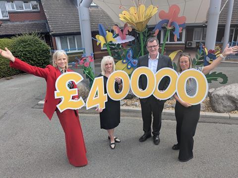 Danni Leggatt, head of organisational development for Culina Group, Michelle Anderson, the Culina colleague driving the fundraising, CEO Liam McElroy and Emma Entwistle, head of internal communications.
