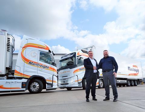 Chris Slowey, Manfreight MD (left) and Stephen Mallett, head of sales at Schmitz Cargobull UK & Ireland.