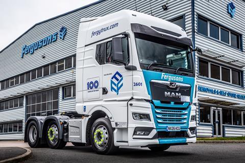 The centenary anniversary vehicle with GX cab features a special '100 Years on the Road' livery.